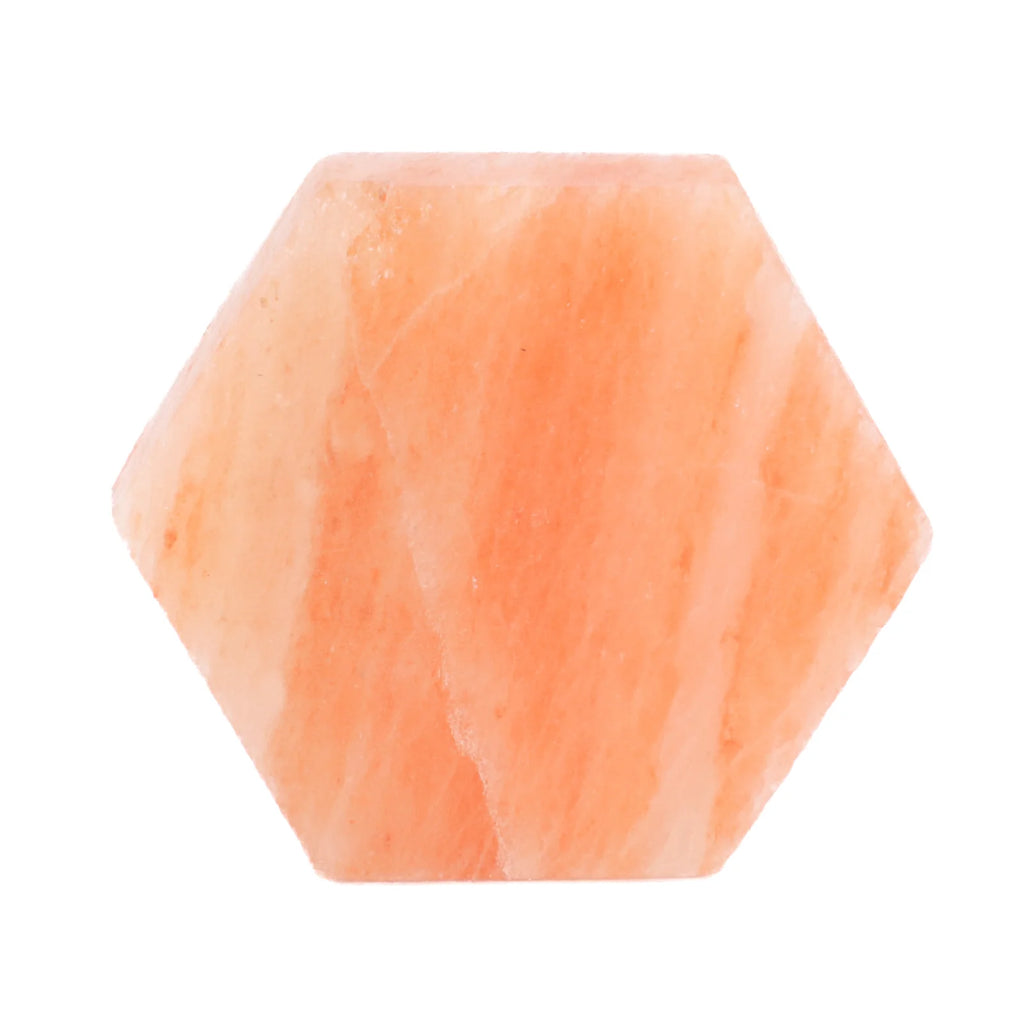 Hexagonal pink stone on a white background