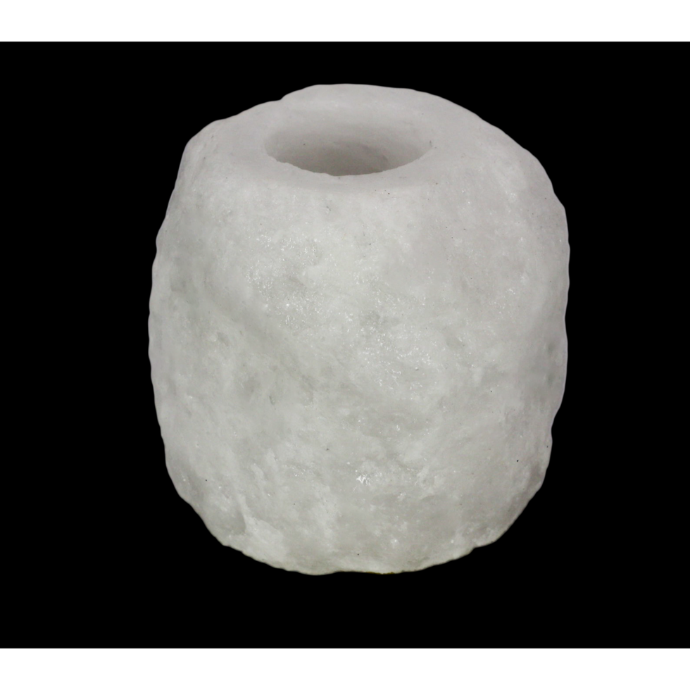 White salt candle with textured surface on a black background