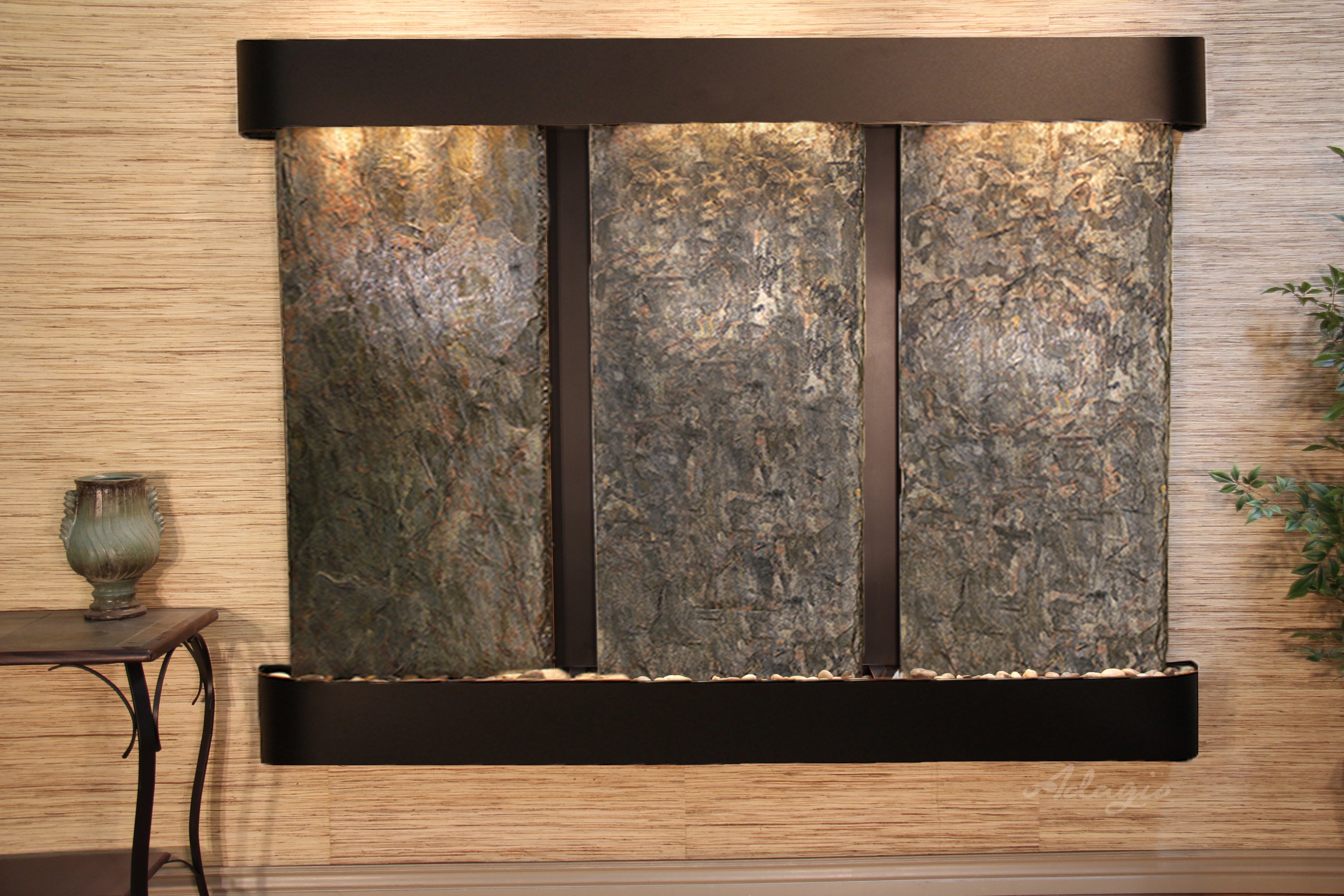 Decorative stone wall feature with a black frame in a room setting.