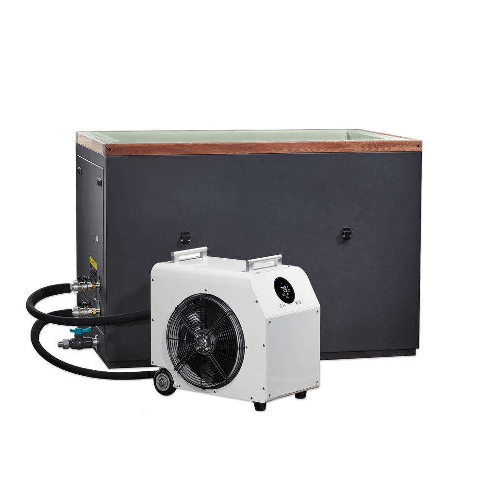 White chiller with black fan and hoses in front of a large black rectangular unit on a white background.