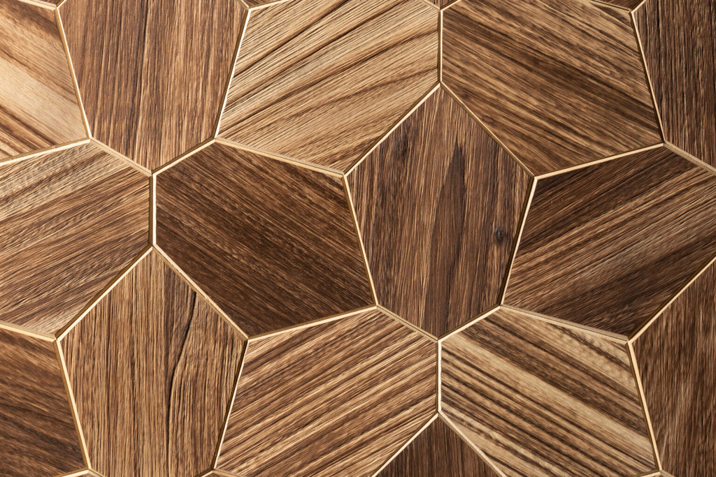 Hexagonal wooden tiles with a geometric pattern