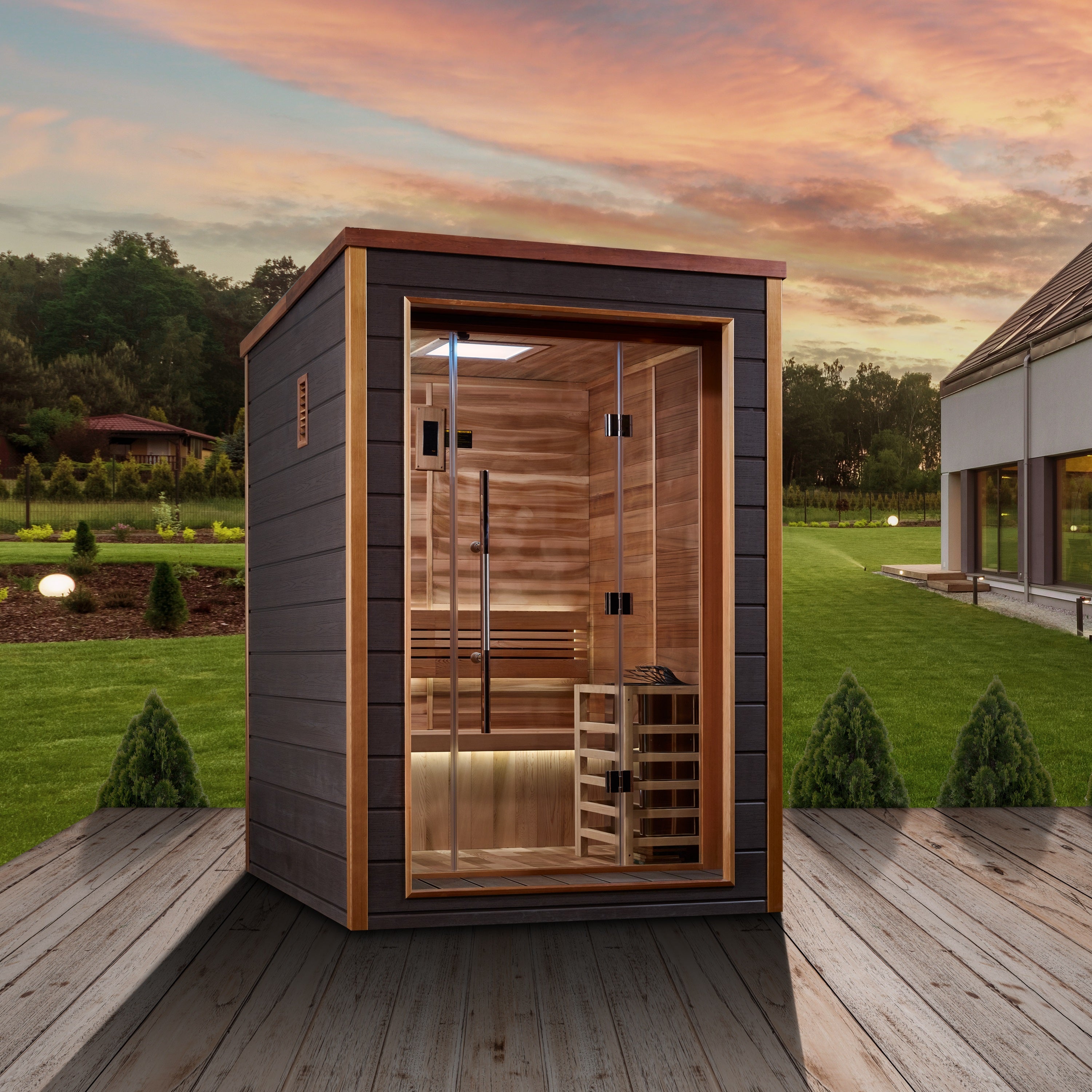 Wooden sauna cabin on a wooden deck with a scenic background