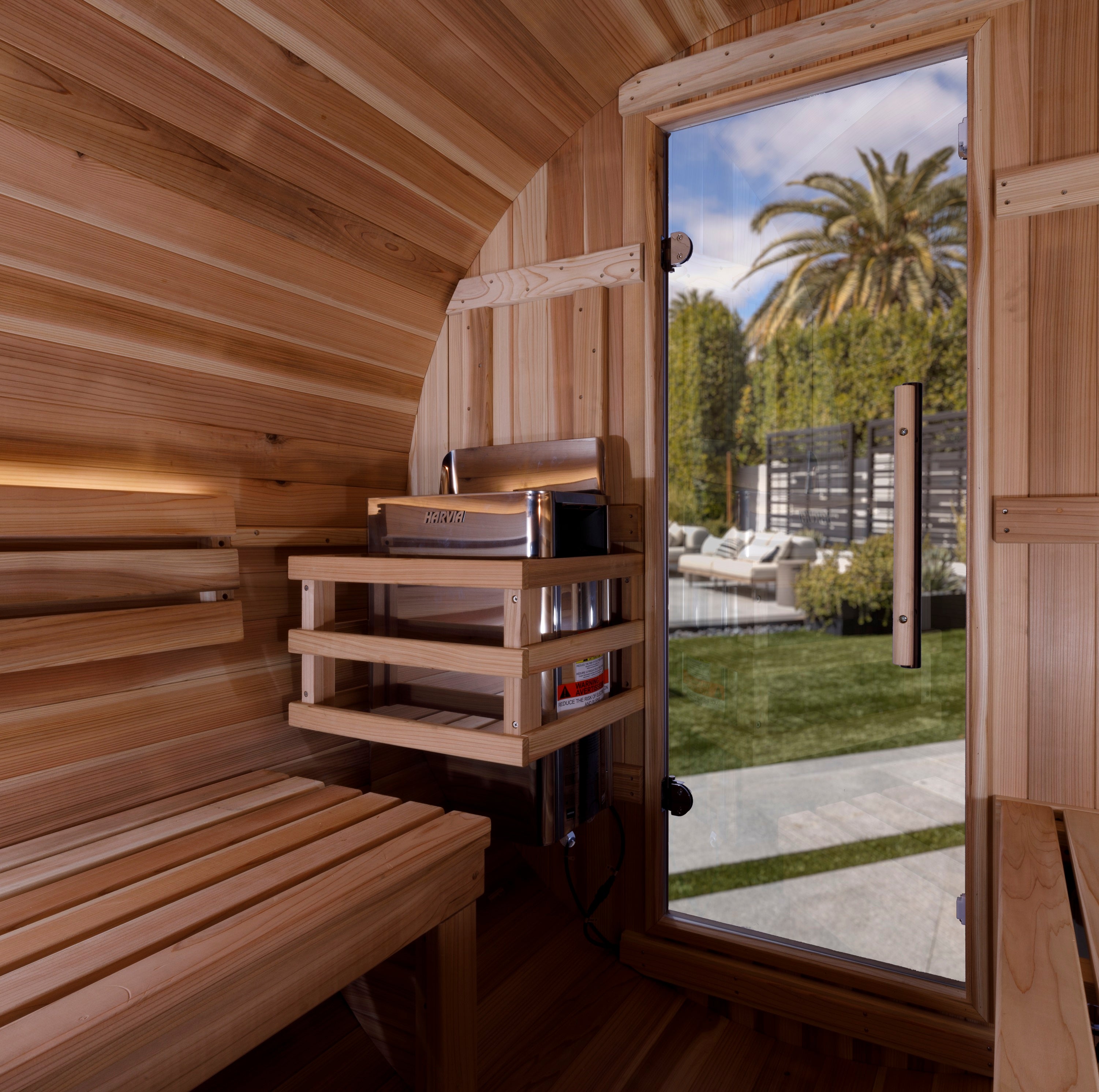 Wooden sauna with a view of trees outside