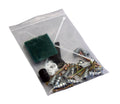 Assorted small hardware items in a clear plastic bag on a white background