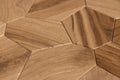 Close-up of hexagonal wooden tiles arranged in a herringbone pattern