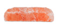 Himalayan salt block with pink and white coloration on a white background