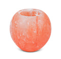 Round pink Himalayan salt lamp on a white background