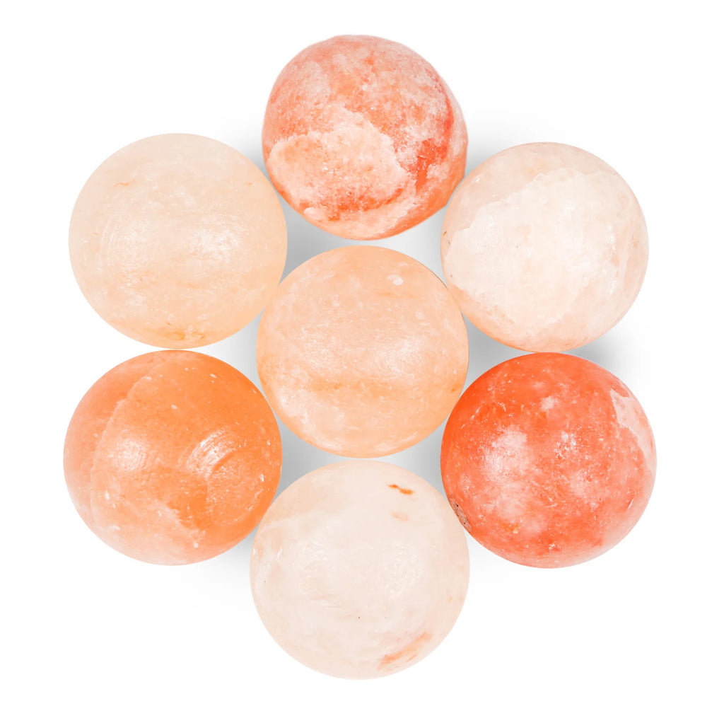 Set of round, salt stones on a white background