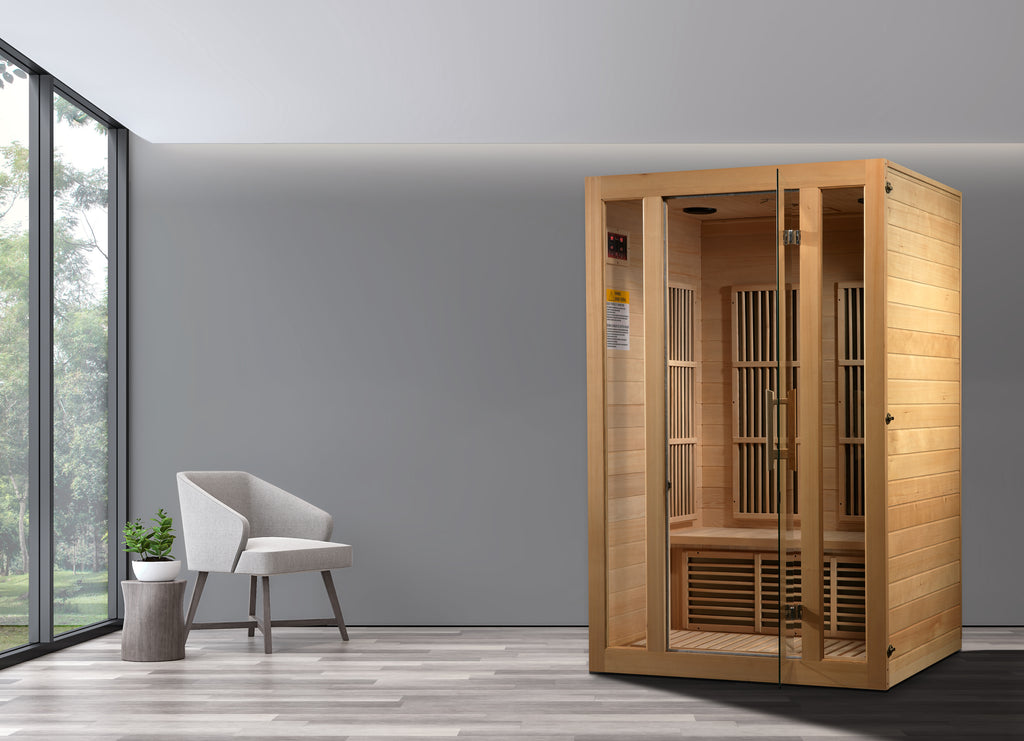 Wooden sauna in a modern room with a chair and plant