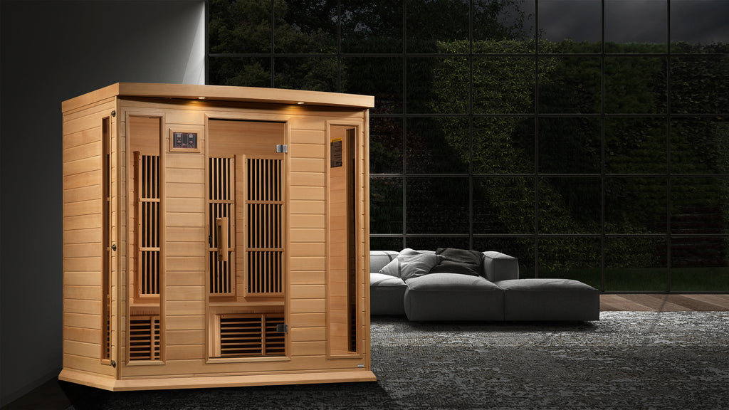 Wooden sauna in a dark outdoor setting with a modern sofa.