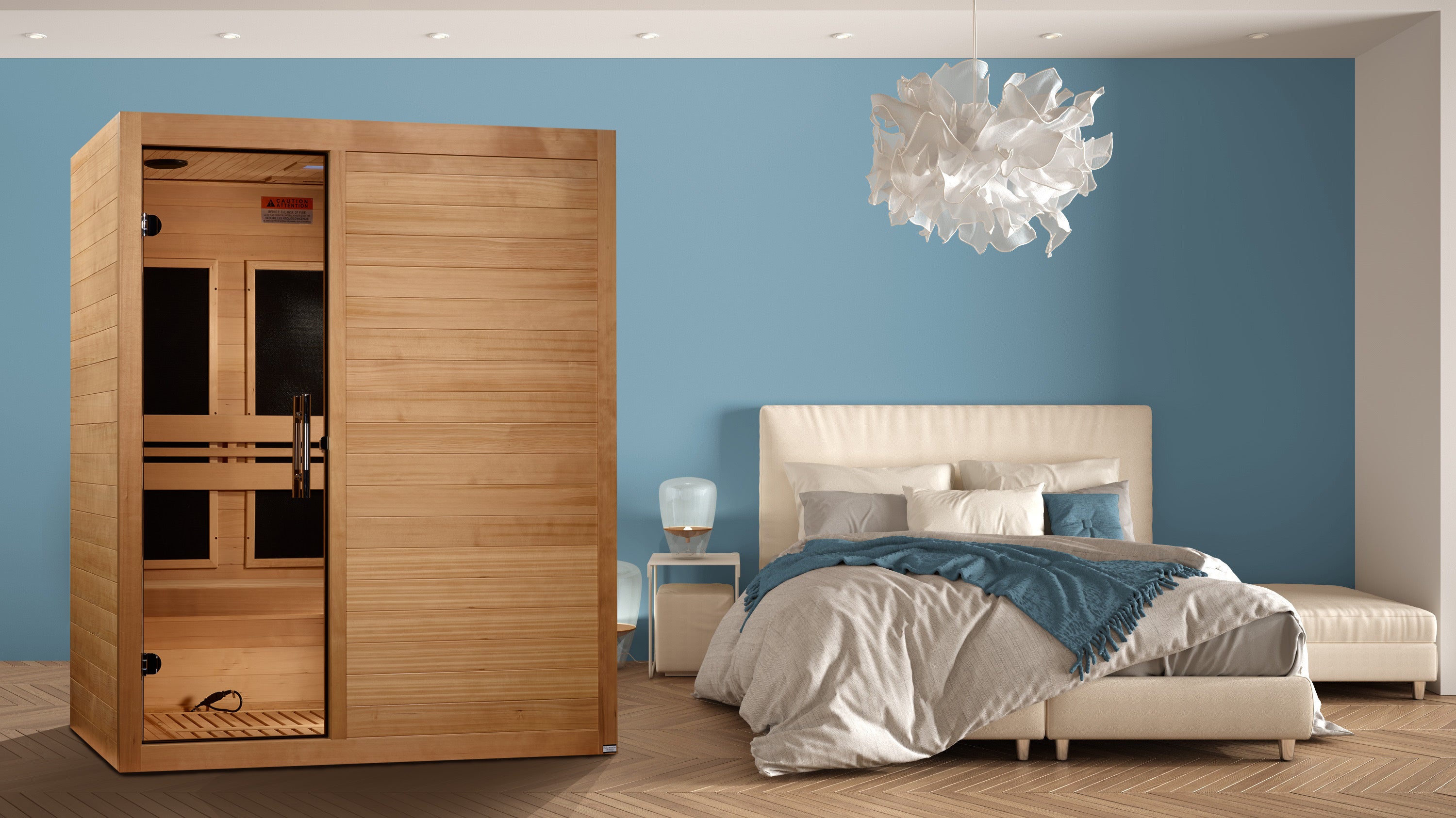 Wooden sauna in a bedroom with a bed and blue wall.