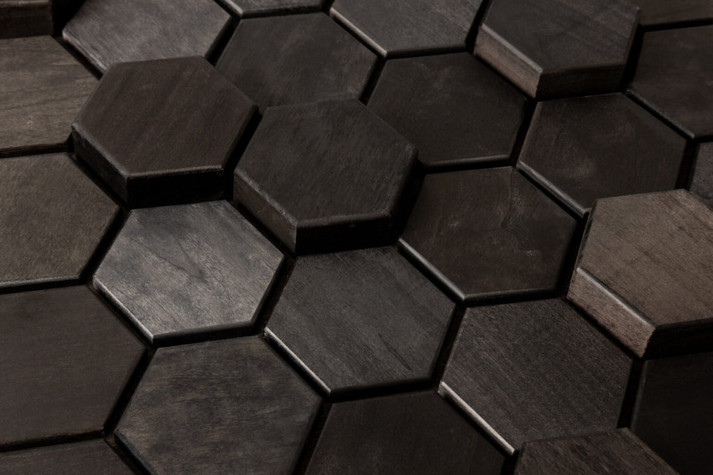 Hexagonal dark wood tiles arranged in a pattern