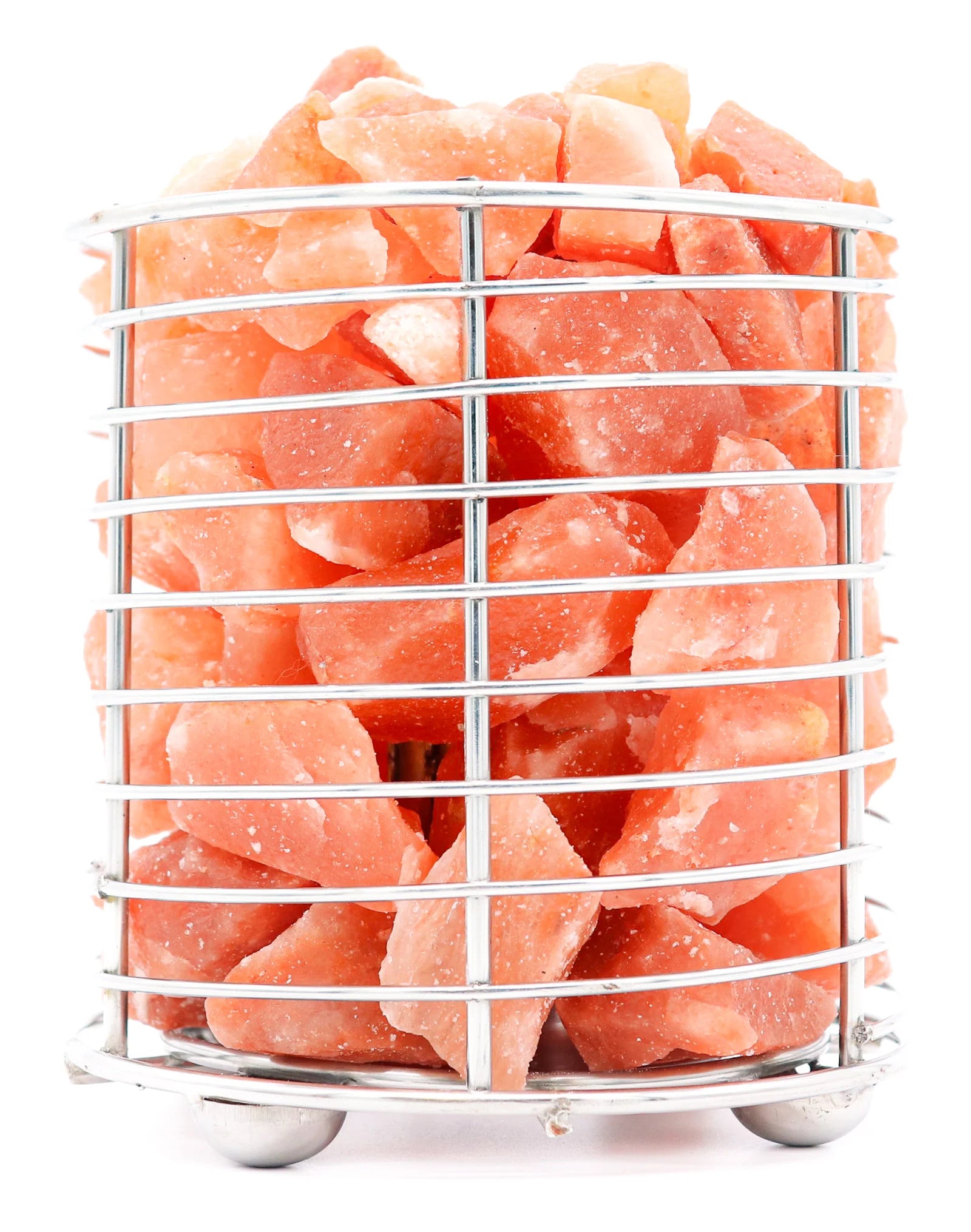 Pink Himalayan salt crystals in a metal basket on a white background