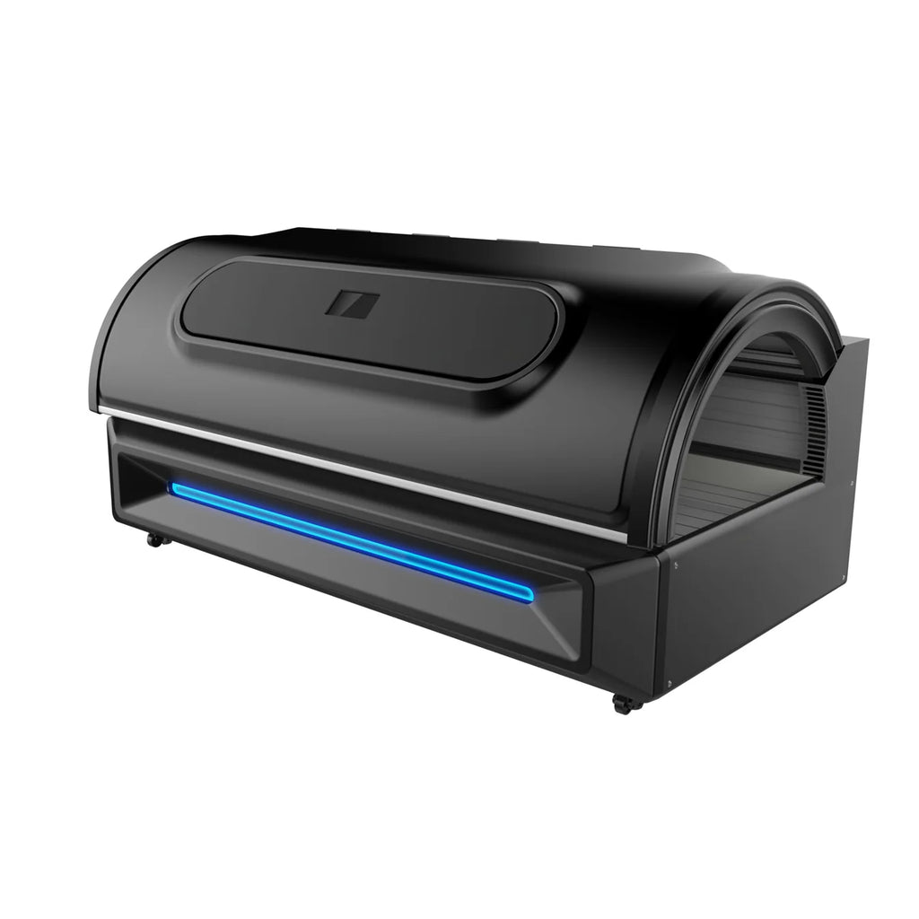 Black and gray red-light therapy bed with a blue light on a white background