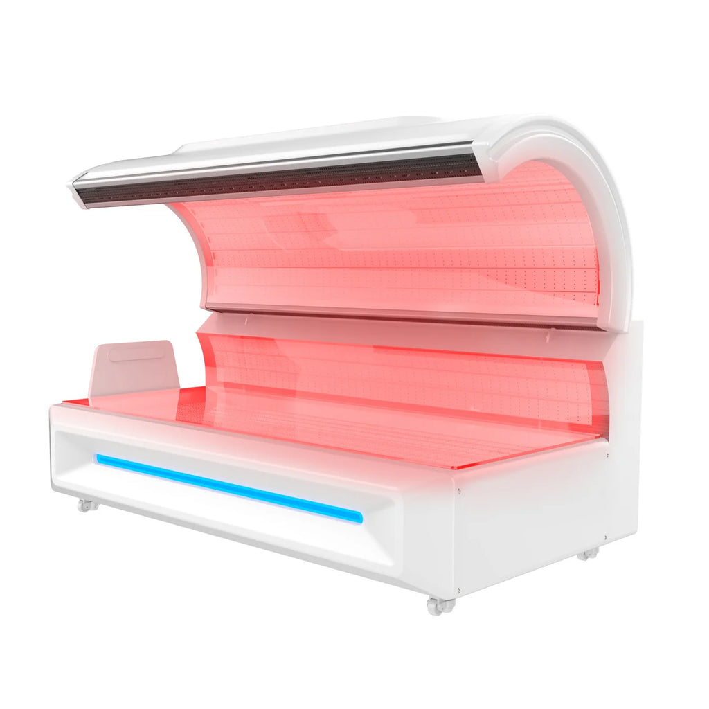 Red-light therapy bed with red interior and white exterior 