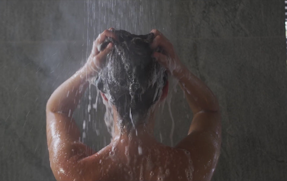 Video of bathroom interior, dancing in the shower, showing smartscreen apps within mirror